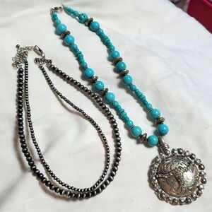 Handmade faux turquoise and silver necklace and Navajo pearls.